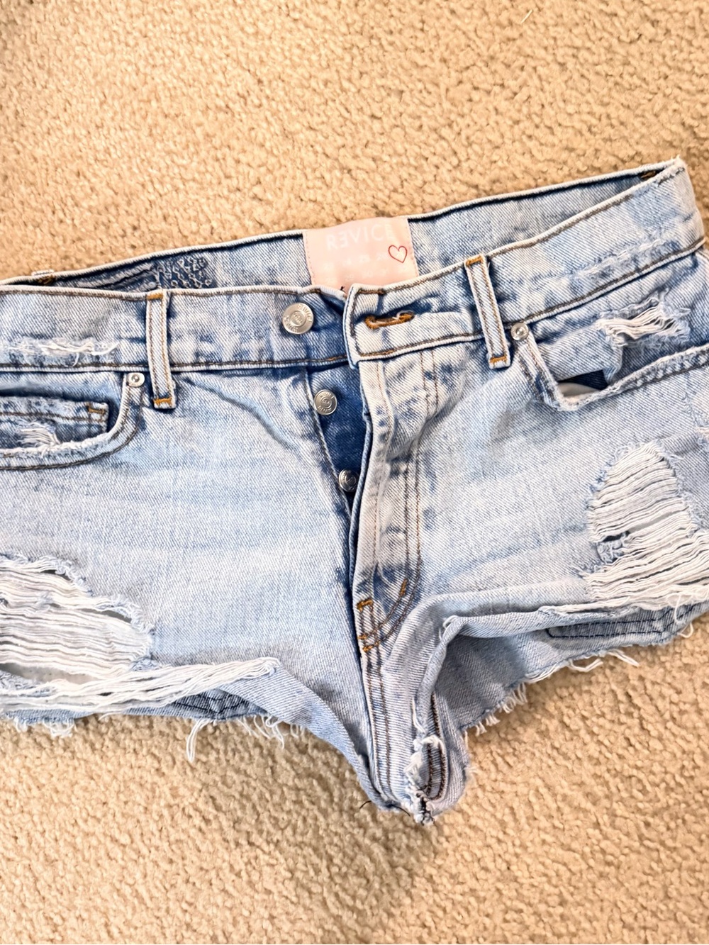 Light Blue Distressed Denim Shorts by (unknown)